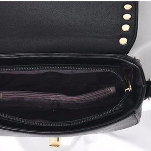 black gold studded handbag inside view edgability