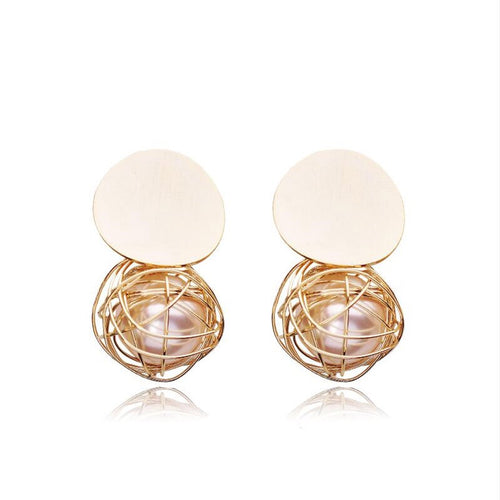 statement earrings gold earrings with pearls edgability
