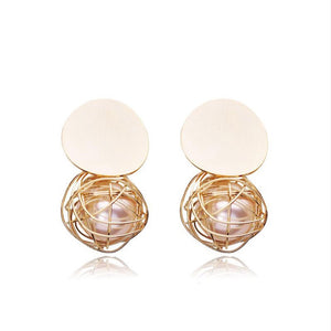 statement earrings gold earrings with pearls edgability