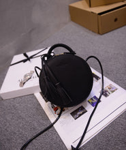 box bag round bag black bag with tassels edgability top view