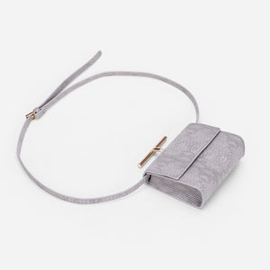grey snakeskin clutch bag with gold handle edgability top view