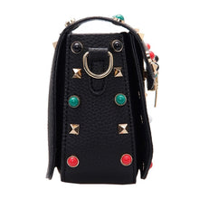 black bag studded bag printed strap edgability side view