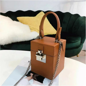 chocolate brown mini box bag with top handle edgability angle view