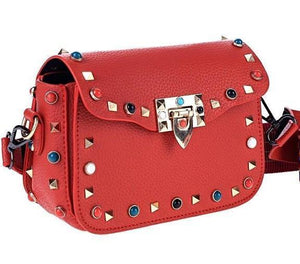 multi coloured studded red bag edgability angle view 