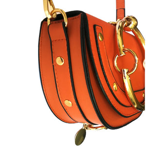 orange wristlet studded bag sling bag edgability side view