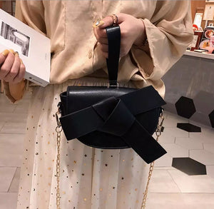 bow on black bag sling bag wristlet belt bag edgability front view