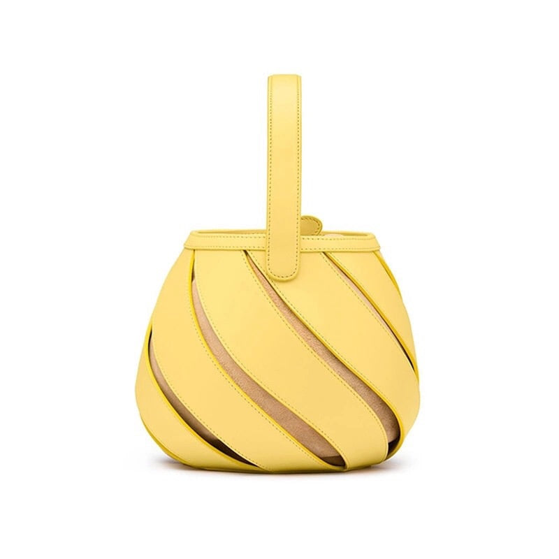 yellow bucket bag sling bag with cut outs edgability