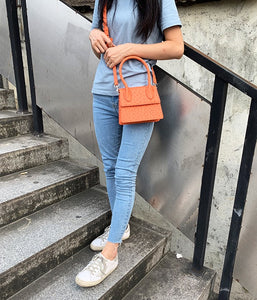 ostrich leather orange bag edgy fashion edgability model view