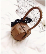 brown bag round bag mini bag clutch bag edgability aerial view
