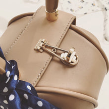 brown bag round bag mini bag clutch bag edgability detail view