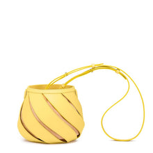 yellow bucket bag sling bag with cut outs edgability front view