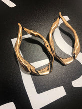 rose gold hoops earrings edgability top view