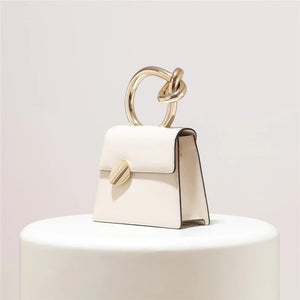 classy white bag formal bag edgy fashion edgability angle view