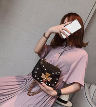 pearl studded butterfly black bag edgability model view