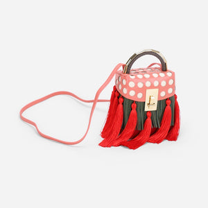 quirky box bag with red tassels edgability front view