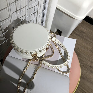 pearl studded white bag box round bag edgability top view