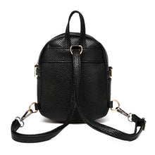 gold studs on black mini backpack back view edgability