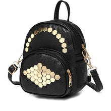 gold studs on black mini backpack angle view edgability