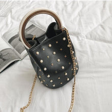 studded bag bucket bag black bag edgability front view