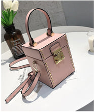 pink studded bag box bag edgability top view