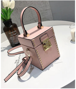 pink studded bag box bag edgability top view