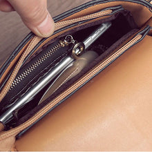 tan studded bag with hoop edgability inside view