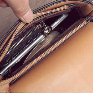 tan studded bag with hoop edgability inside view